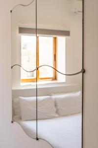 A bed or beds in a room at Impressive View 2BR Flat in St Julian's Bay by ArcoBnb