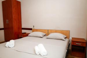 Postel nebo postele na pokoji v ubytování Apartments Djukic