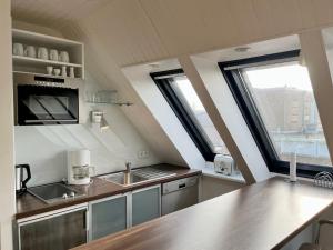 Η κουζίνα ή μικρή κουζίνα στο Appartementhaus Seemöwe Rosenmöwe +2 φωτογραφίες