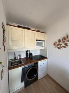 Nhà bếp/bếp nhỏ tại Appartement bord de mer