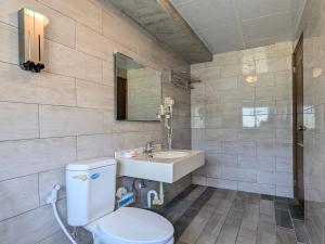 Koupelna v ubytování A-Lang Homestay + 37 fotografií