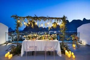 Fotografie z fotogalerie ubytování Yangshuo QingQing Riverside Inn v destinaci Jang-šuo