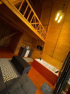 an overhead view of a living room with a table at Amasra Blue Horizon Bungalow in Eskiömerler