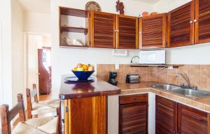 Kuchyň nebo kuchyňský kout v ubytování Beachfront 2BR Condo in Playa I Steps to 5th Ave!