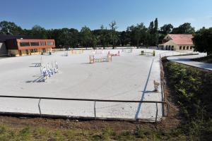 an empty playground in front of a building at Královický Dvůr in Slaný