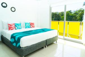 Hotel Caribbean Coral客房内的一张或多张床位
