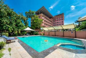 Bazén v ubytování Pagoda Resorts Alleppey nebo v jeho okolí