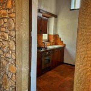 A kitchen or kitchenette at Il Pianetto Holiday Accomodation