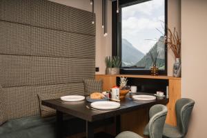 Posezení v ubytování Alpiner Glam Penthouse in der Residenz Silvretta - Inklusive Silvretta Card Premium