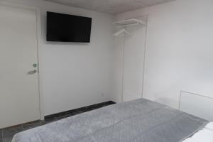 Postel nebo postele na pokoji v ubytování Birkelse Hotel og Kro