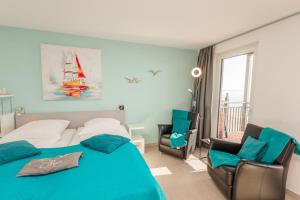 Ένα ή περισσότερα κρεβάτια σε δωμάτιο στο Nordland Appartements Wohnung Aerö +13 φωτογραφίες