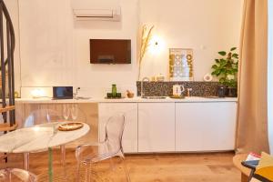 Kuchyň nebo kuchyňský kout v ubytování Chez Camille - Boutique Aparthotel au coeur de Bordeaux