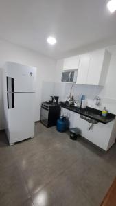Kuchyň nebo kuchyňský kout v ubytování Residencial 101 Ilha Grande