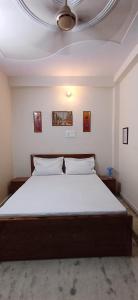 Katil atau katil-katil dalam bilik di Hotel kusum inn