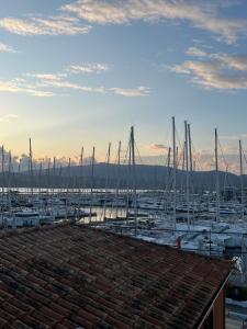 a group of boats docked in a harbor at Martsalo in Lefkada Town