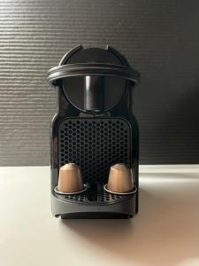 a black toaster sitting on top of a table at Martsalo in Lefkada Town