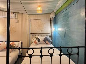 Posteľ alebo postele v izbe v ubytovaní The Memory Hostel