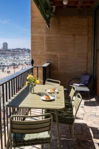 Ein Balkon oder eine Terrasse in der Unterkunft Superbe Appartement, vue Notre Dame de la Garde, Vieux port
