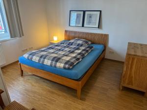 Postel nebo postele na pokoji v ubytování K9 Wohnungen