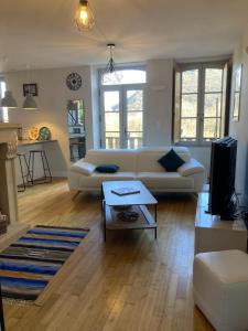 Posezení v ubytování Duplex-Au château ambulant-au bord de la Dordogne