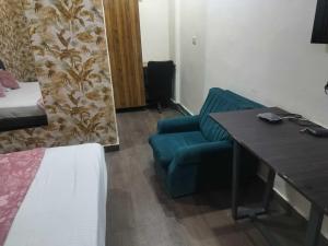 Postel nebo postele na pokoji v ubytování Hotel O Shubkamna