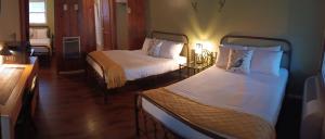 Postel nebo postele na pokoji v ubytování Trees Motel
