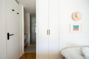 Ein Bett oder Betten in einem Zimmer der Unterkunft Superbe Appartement, vue Notre Dame de la Garde, Vieux port