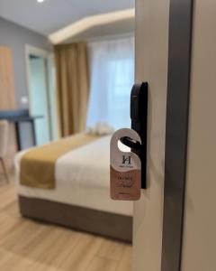 Voodi või voodid majutusasutuse Alko Hotel Bushat toas