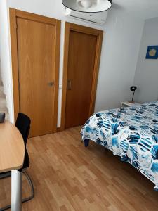 Łóżko lub łóżka w pokoju w obiekcie Loft luminoso Alcorcón M-40 Madrid