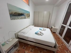 Katil atau katil-katil dalam bilik di La casa di Vicky