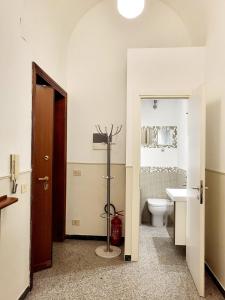 a bathroom with a toilet and a sink at Monteoppio one in Rome +33 photos