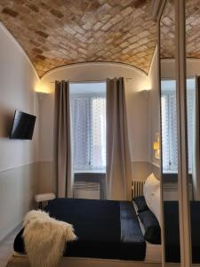 A bed or beds in a room at Monteoppio one Még 33 kép