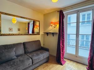 Χώρος καθιστικού στο Studio 150m to Notre Dame