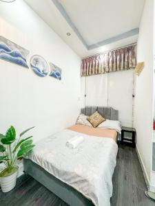 Postel nebo postele na pokoji v ubytování H2T Home