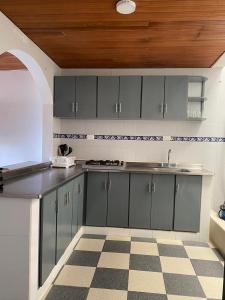 Kuchyň nebo kuchyňský kout v ubytování Las Margaritas Frente al Mar 2