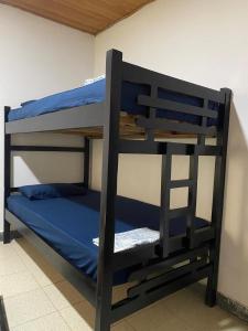 Postel nebo postele na pokoji v ubytování Las Margaritas Frente al Mar 2