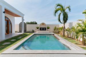 Bazén v ubytování Karang Padma Villas nebo v jeho okolí