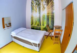 Postel nebo postele na pokoji v ubytování Recanto Berlin