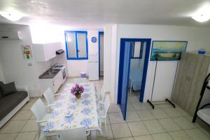 Photo de la galerie de l'établissement La Corte sul Mare Puglia On line, à Torre San Giovanni 58 autres photos