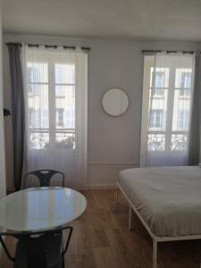 Postel nebo postele na pokoji v ubytování Chambre privée - Vue Tour Eiffel