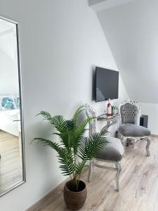 TV a/nebo společenská místnost v ubytování Duna-Part Deluxe