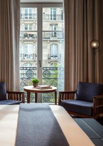En eller flere senge i et værelse på Mandarin Oriental Lutetia, Paris