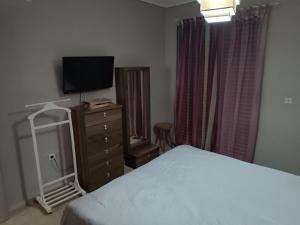 Postel nebo postele na pokoji v ubytování COMFORTABLE BEACHFRONT APARTMENT