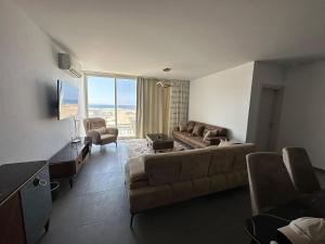 Χώρος καθιστικού στο Shaheenz Hospitality