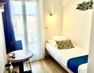 Кровать или кровати в номере Hotel Solara