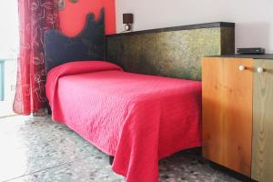 Postel nebo postele na pokoji v ubytování Hotel Pietra Verde