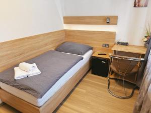 Postel nebo postele na pokoji v ubytování Ubytování v Brně - Schodová