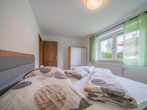Postel nebo postele na pokoji v ubytování Kaiser Traum I
