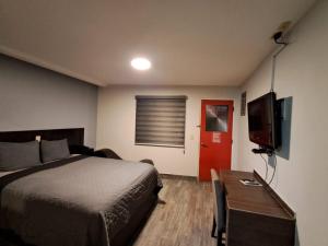 TV o dispositivi per l'intrattenimento presso Lizvan Hotel-Motel