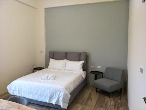 Postel nebo postele na pokoji v ubytování Good moment B&B